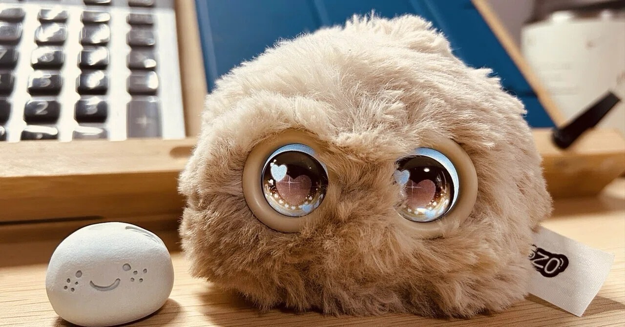 Fuzozo, a fluffy AI companion with expressive eyes