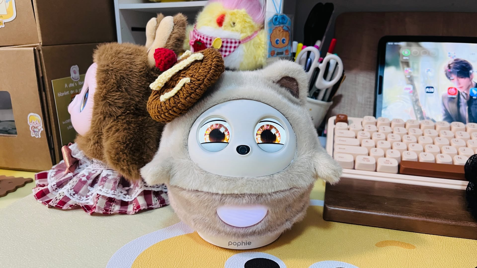 Pophie wearing a crocheted cake hat
